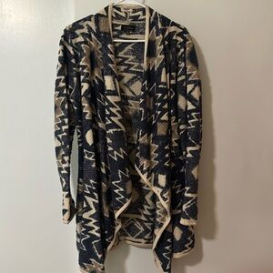 Barely worn cardigan! A fun texture and print.